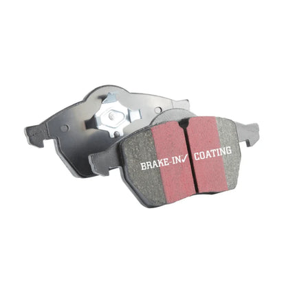 Close-up of EBC Brakes Ultimax OEM Plus rear brake pad showing inner friction surface for Lexus IS300