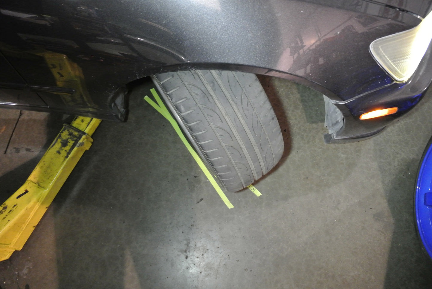 Front wheel of a Lexus IS300 at full steering lock showing the increased angle provided by Megan Racing drift knuckles