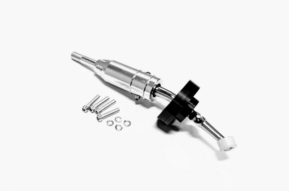NST short shifter for Lexus IS300 shown from alternate angle highlighting linkage design, pivot point, and shift base mounting detail