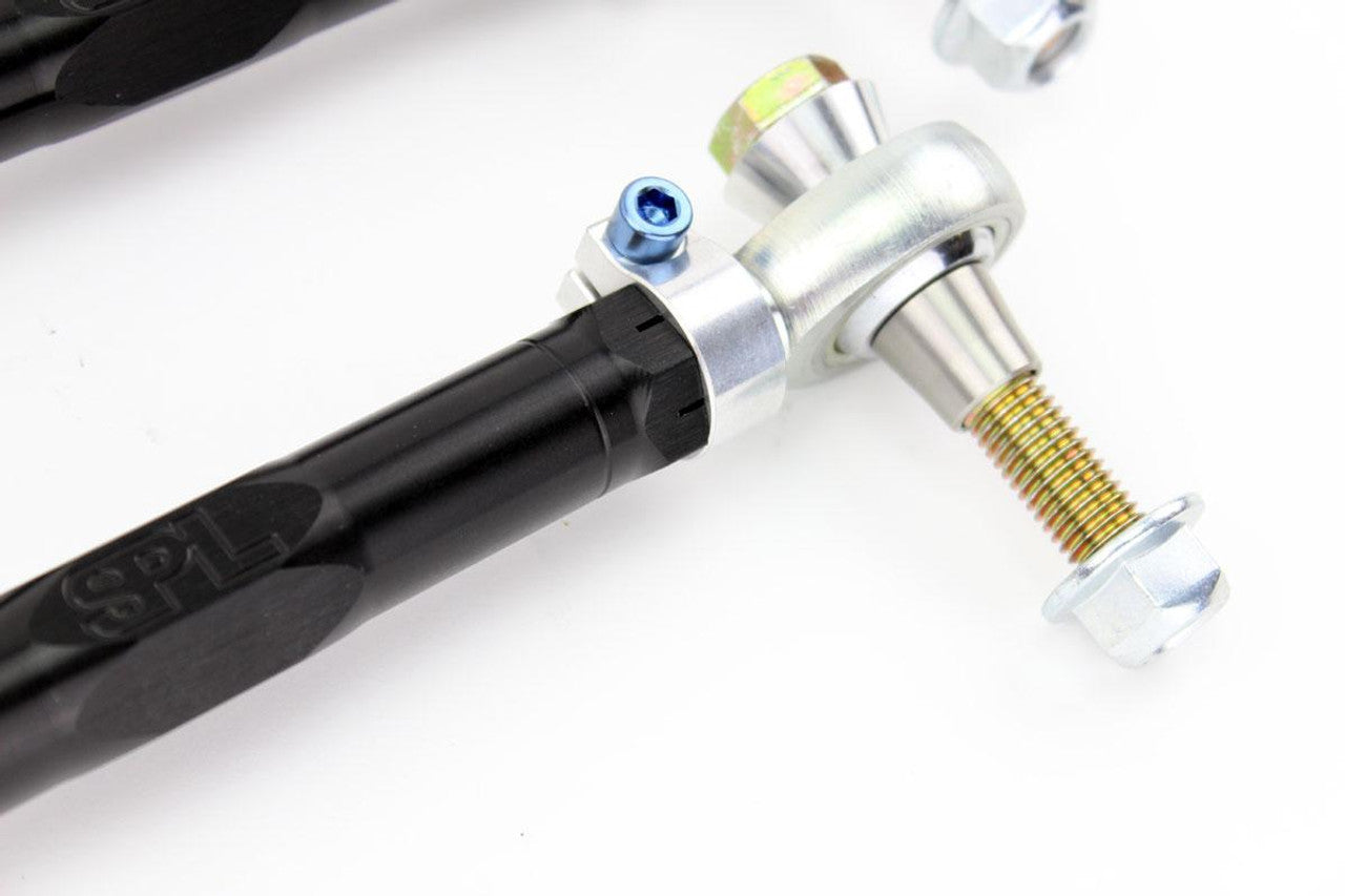 SPL Parts Titanium Series rear toe arms for Lexus IS300 2001-2005 close-up view highlighting adjustment turnbuckle, rod ends, and hardware detail