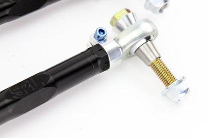 SPL Parts Titanium Series rear toe arms for Lexus IS300 2001-2005 close-up view highlighting adjustment turnbuckle, rod ends, and hardware detail
