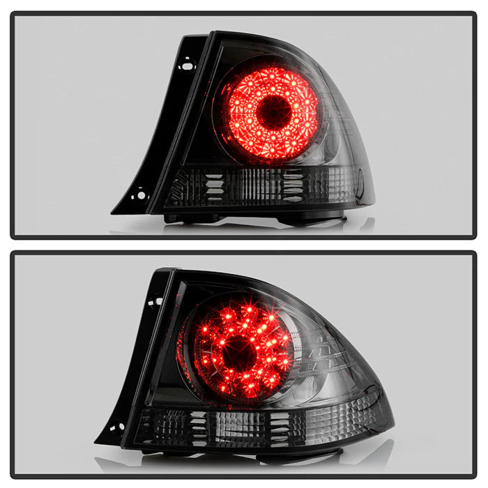 Spyder Auto smoke LED taillights for Lexus IS300 2001-2005 illuminated view showing LED light pattern through smoked lens